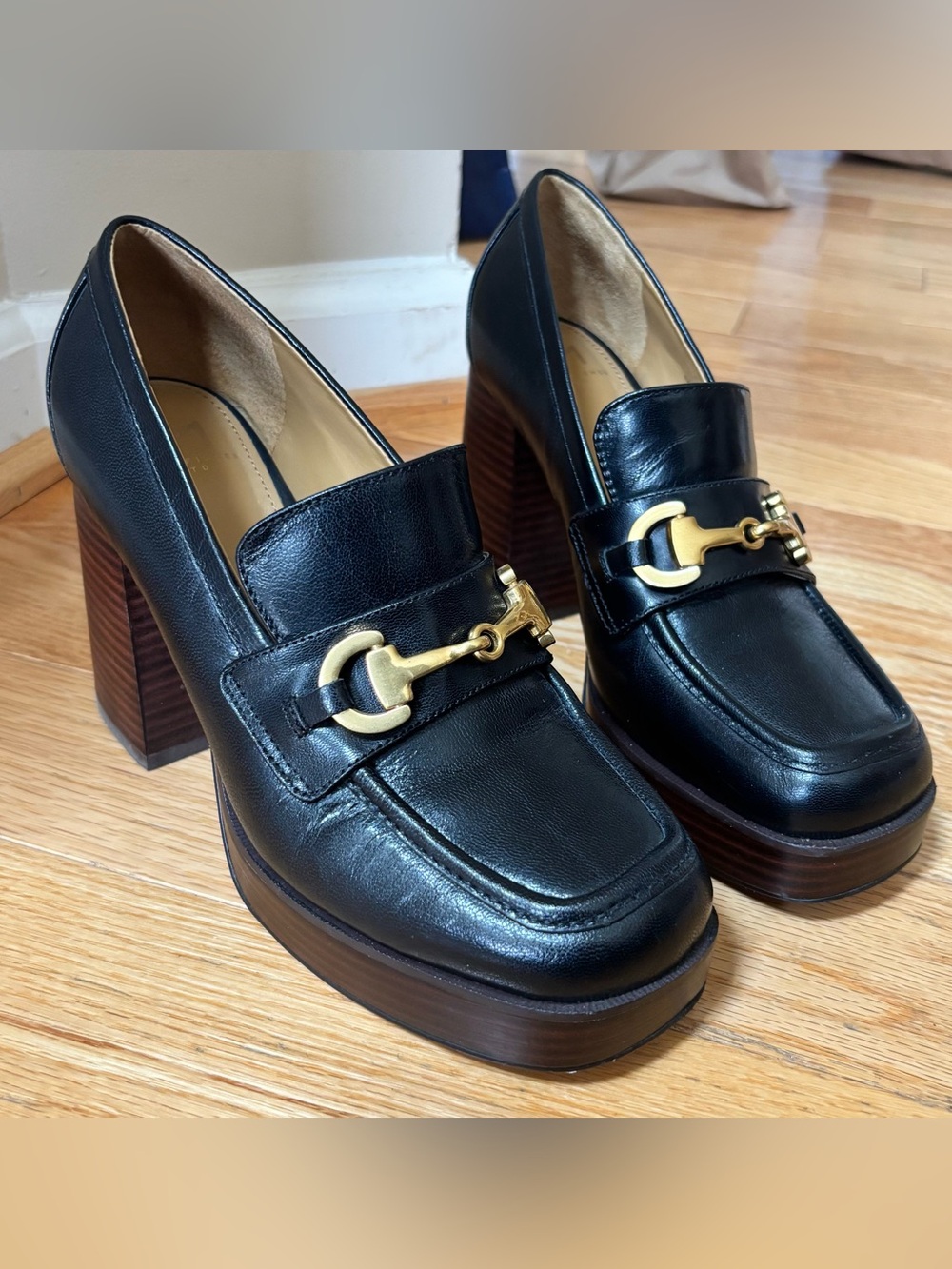 Marc Fisher LTD black leather heeled loafers with gold buckle detail